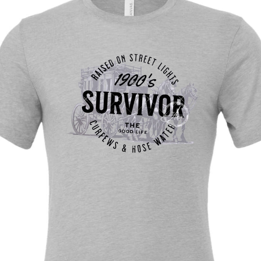 Grey crew neck t-shirt with black writing and horse and buggy faded in background