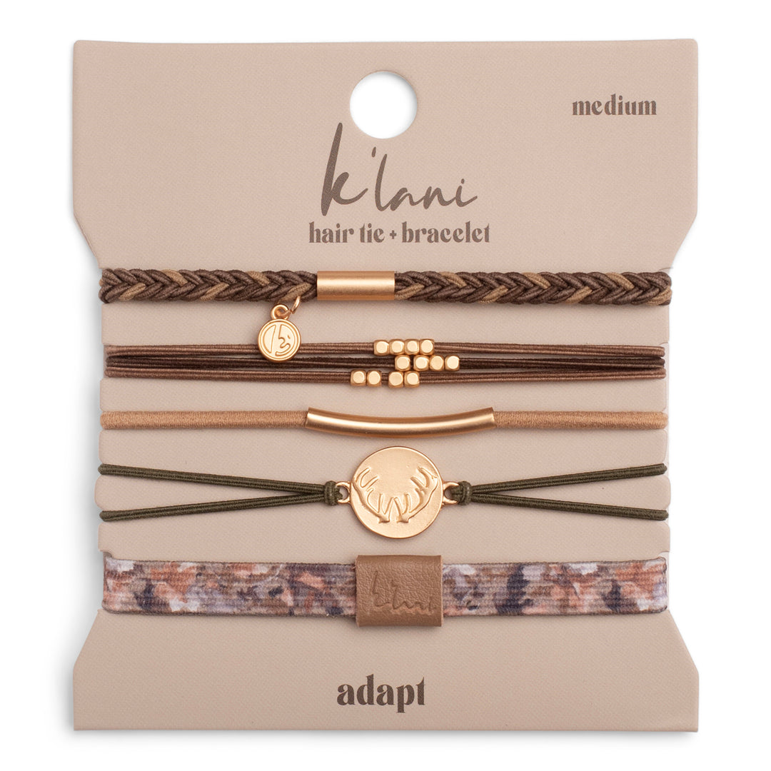 Set of hair ties and bracelets on a &