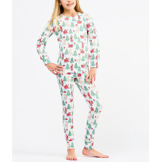 kids long sleeve and pants pajama set Featuring a whimsical print of Santas, reindeer, and Christmas trees