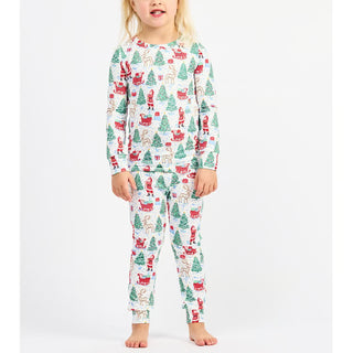 toddler pajama set Featuring a whimsical print of Santas, reindeer, and Christmas trees