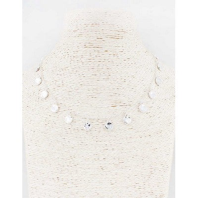 Close-up of a textured white surface with small holes