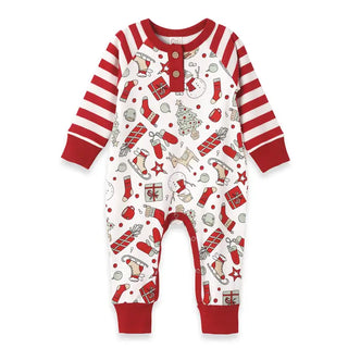 baby romper with red and white striped sleeves and whimsical christmas pattern featuring stockings, gifts, trees, and ice skates