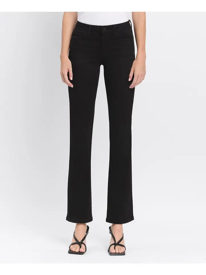 Person wearing black pants on a white background