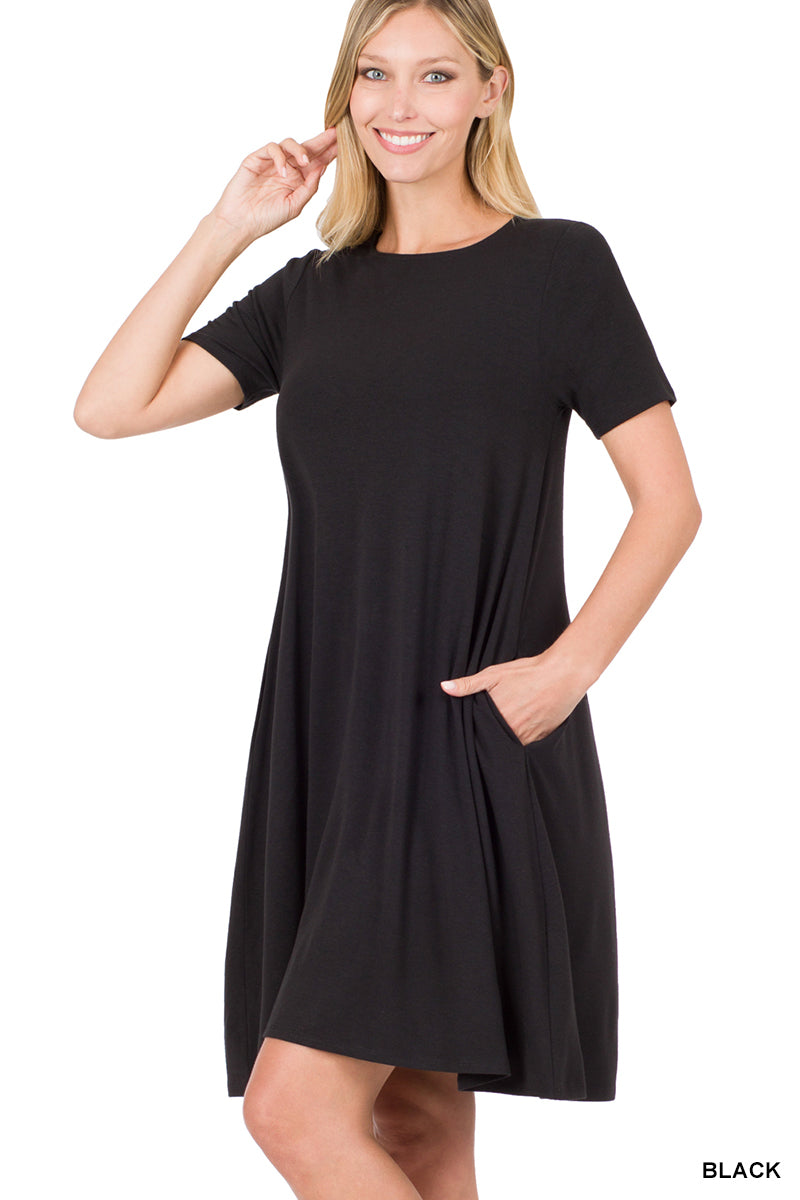 Woman wearing black short sleeve dress
