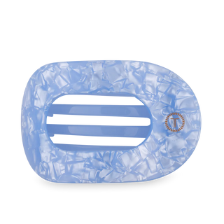 Blue marbled hair clip with a brand logo on a white background