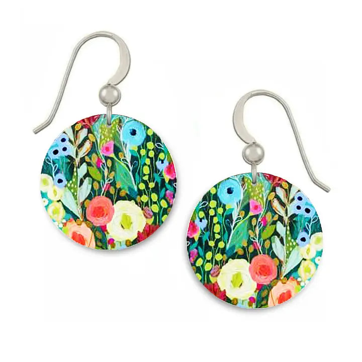 Colorful floral earrings on a white background