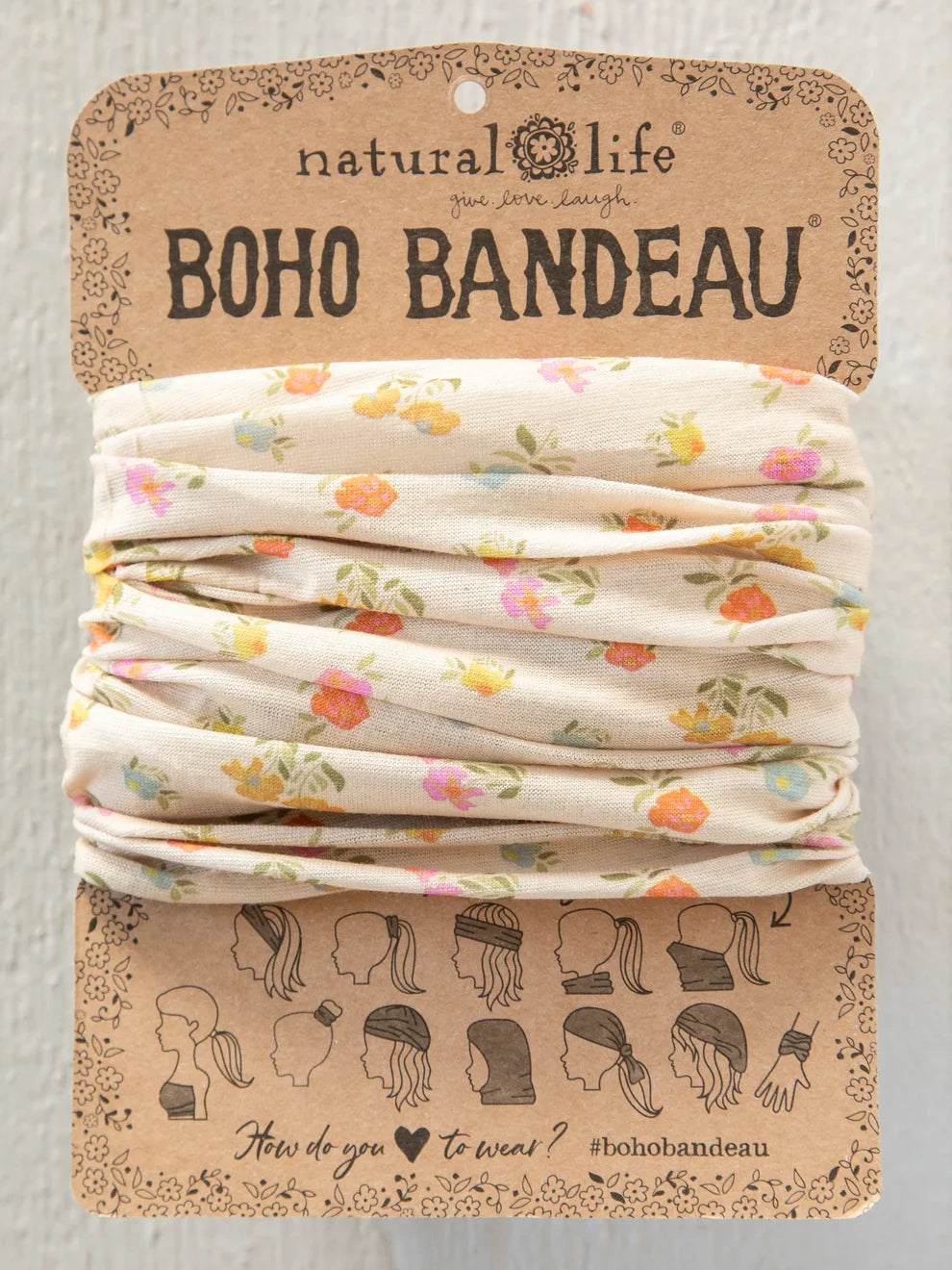 Boho bandeau with floral pattern on a natural life branded card