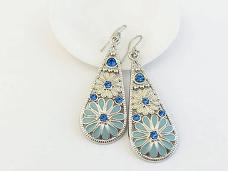 Silver teardrop dangle earrings with blue enamel and stone accents