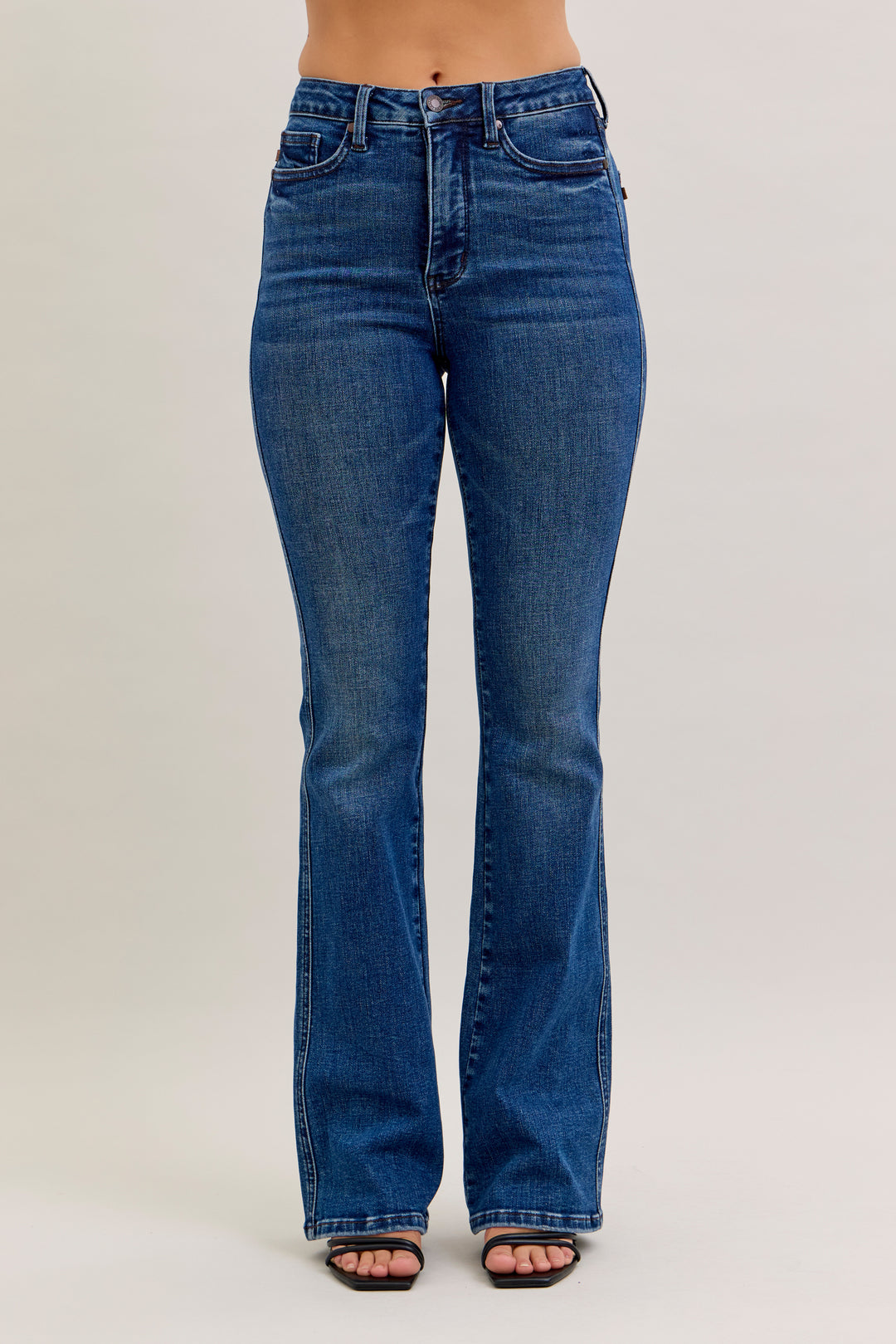 Blue jeans on a plain background