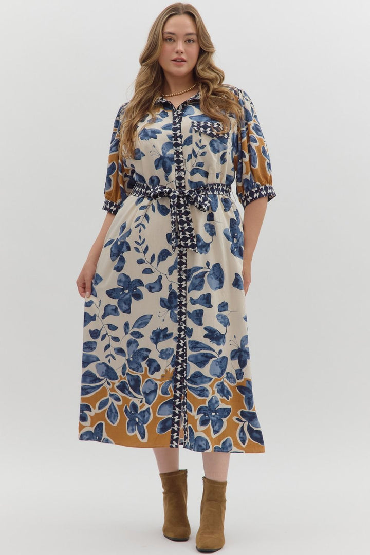 Woman wearing a floral dress with a white background