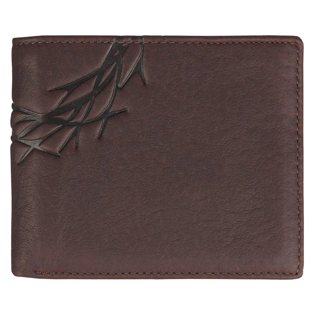Brown leather wallet with a decorative element on a white background