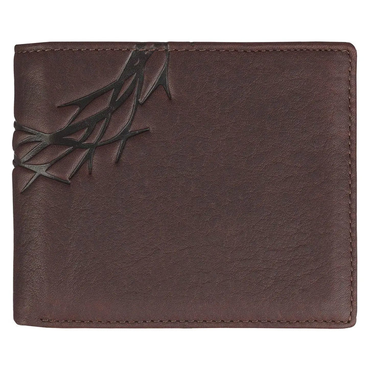 Brown leather wallet with a decorative element on a white background