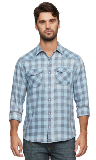man wearing a blue plaid button up shirt
