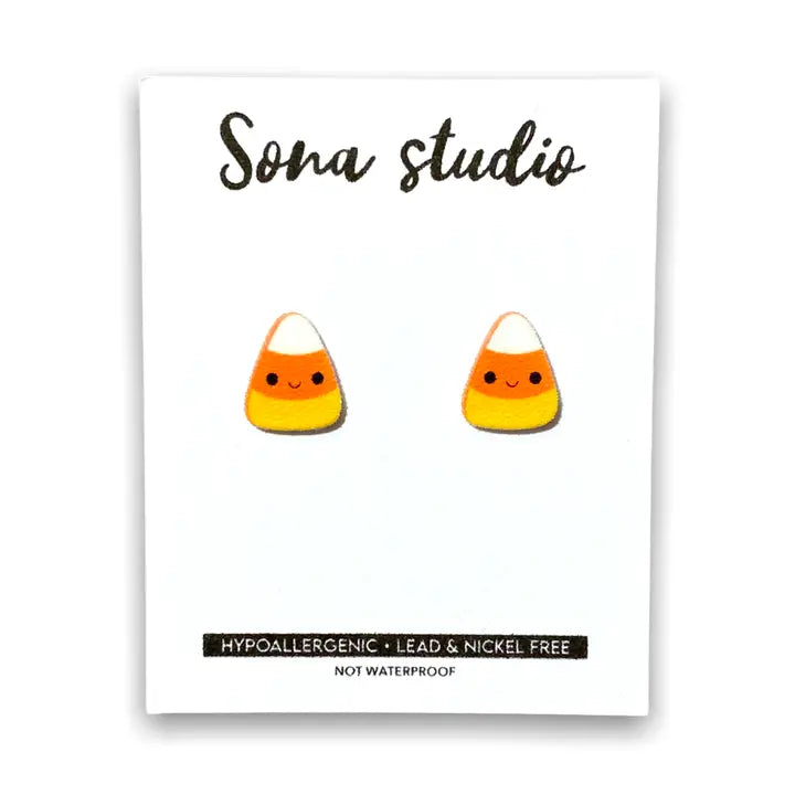 candy corn earrings with a small smiley face