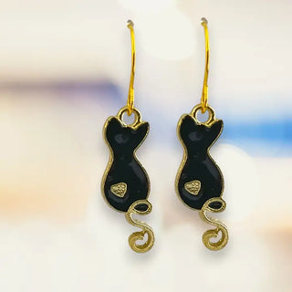 Black cat dangle earrings with gold accents