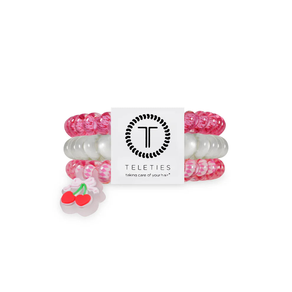 set of 3 coil hair ties in pink and white