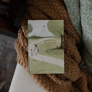 Book titled 'Family' by Chris Mercer on a textured surface