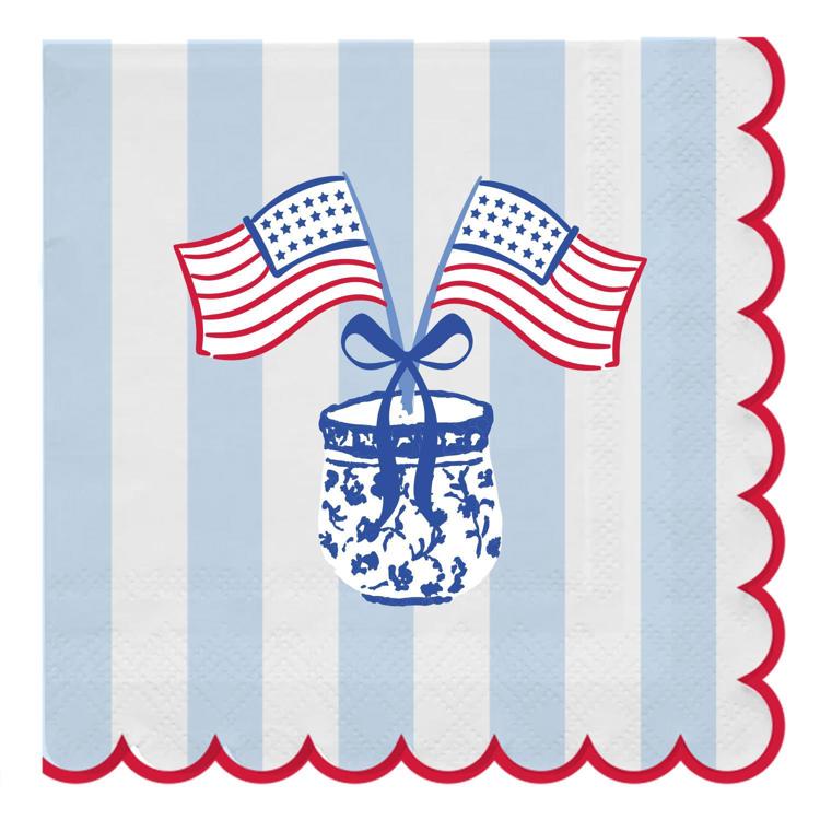 Decorative napkin with American flags and a blue chinoiserie jar on a striped background