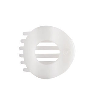white flat circle shaped hair clip