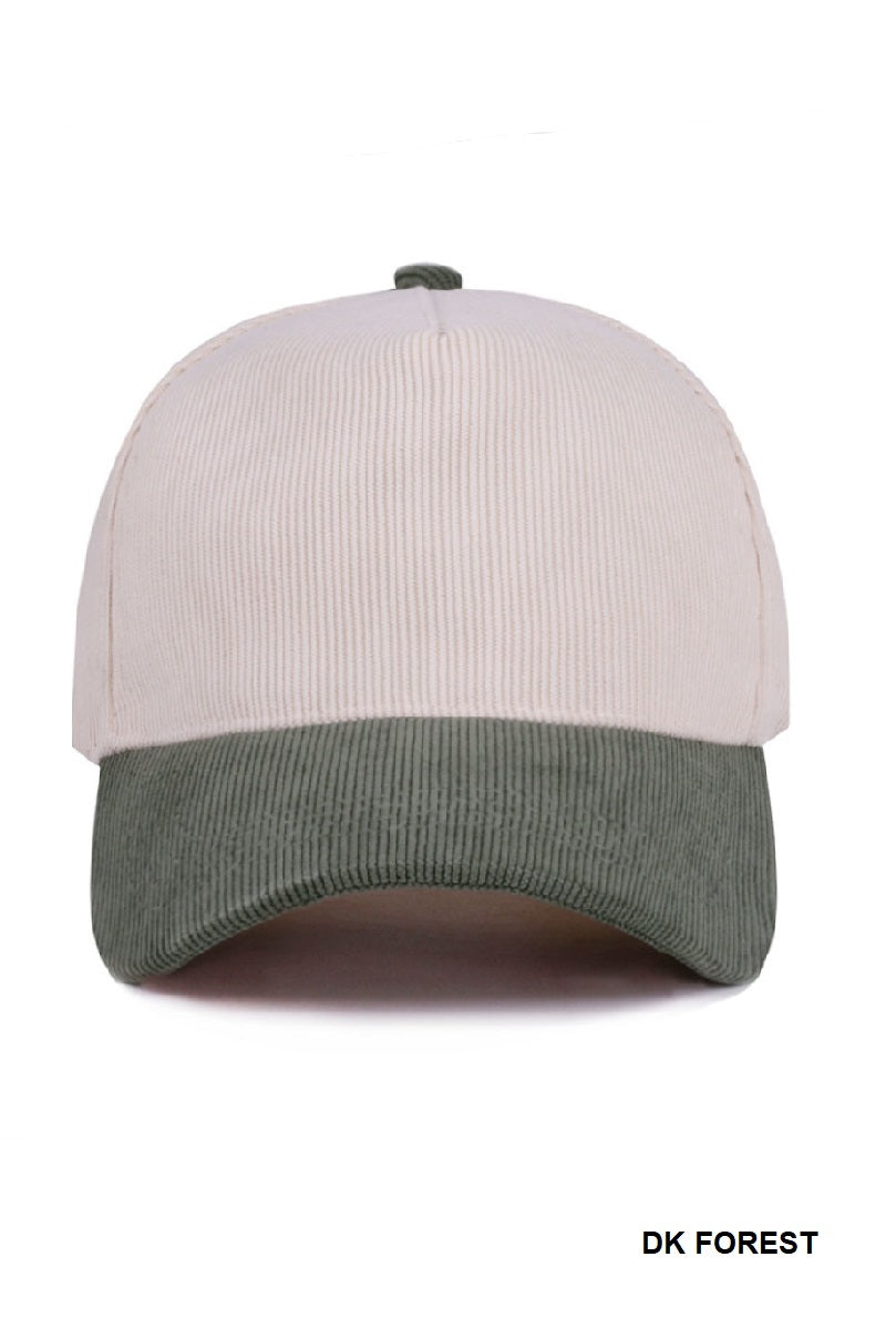 Two-tone cap with beige top and green bottom on a white background