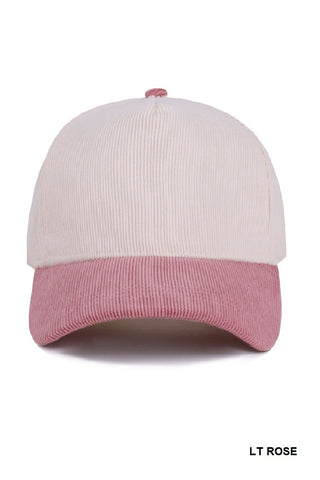 Light rose and white cap on a white background