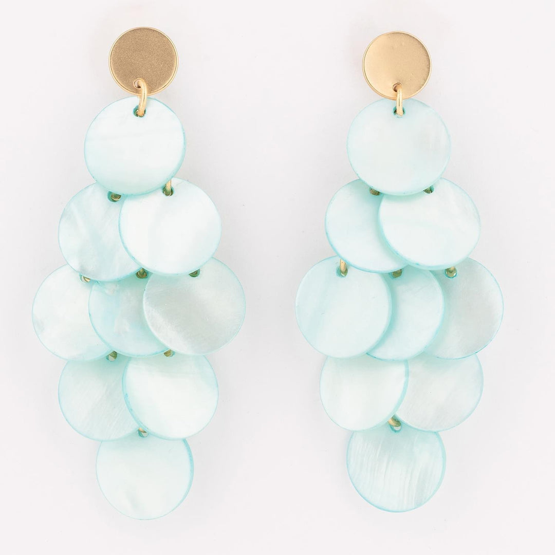 Pair of light blue beaded earrings with gold circular tops on a white background