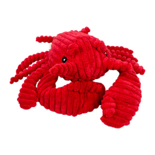 Red plush lobster toy on a white background