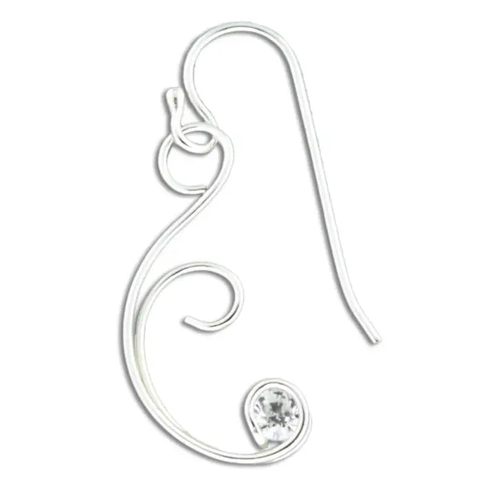 Silver earring with a clear gemstone on a white background