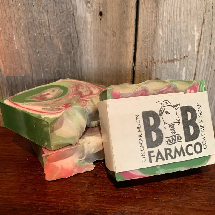 Bar of soap with a visible brand label on a wooden surface