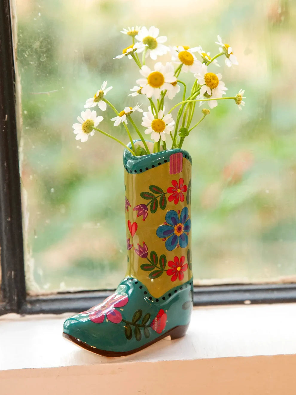 bud vase shaped like a cowboy boot