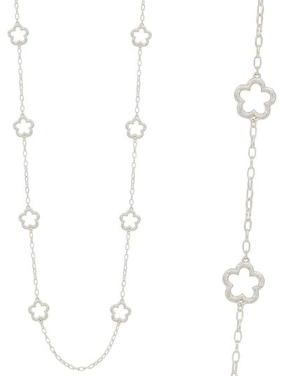 Silver chain necklace with clover-shaped links on a white background