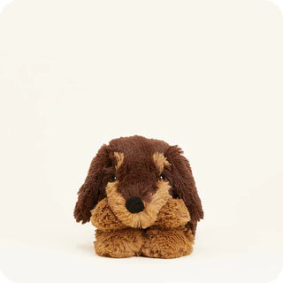 Plush toy dog with brown and beige fur on a white background
