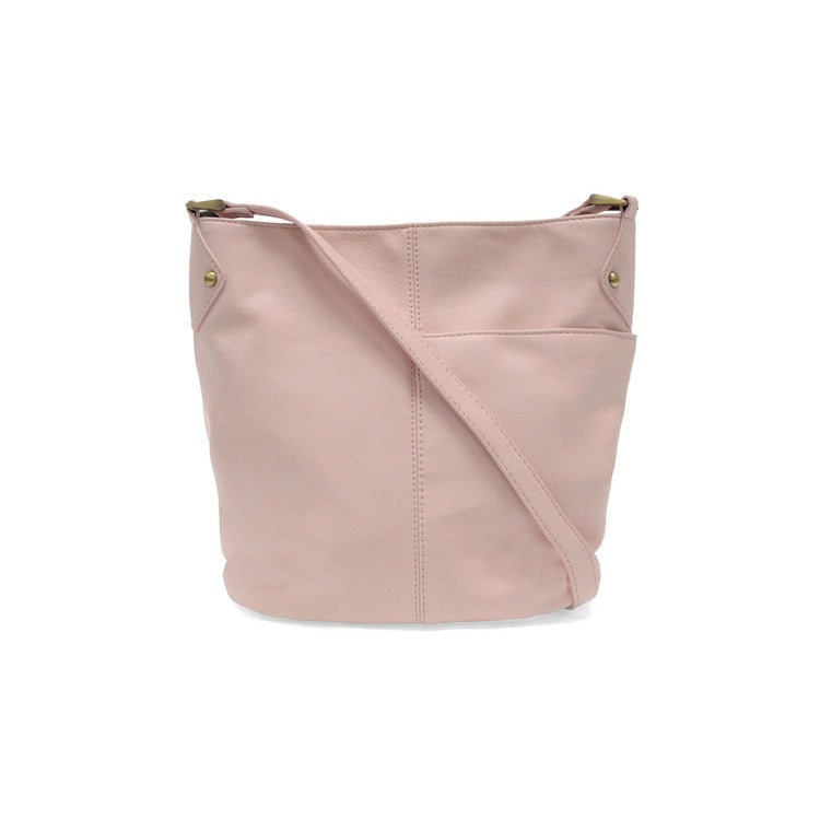 Pink handbag with a strap on a white background