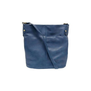 Blue leather handbag with a strap on a white background