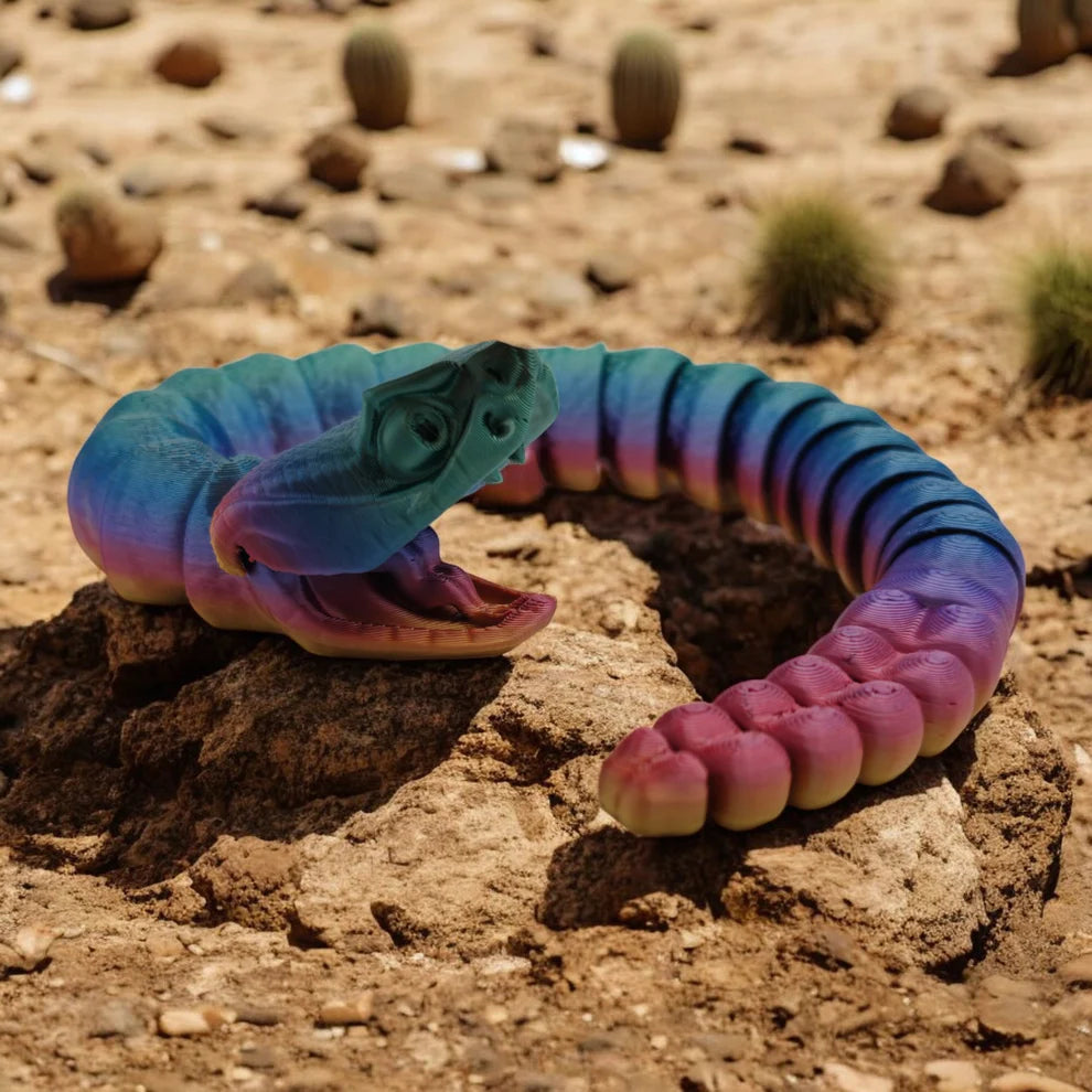 Colorful snake-like toy on a rocky desert landscape