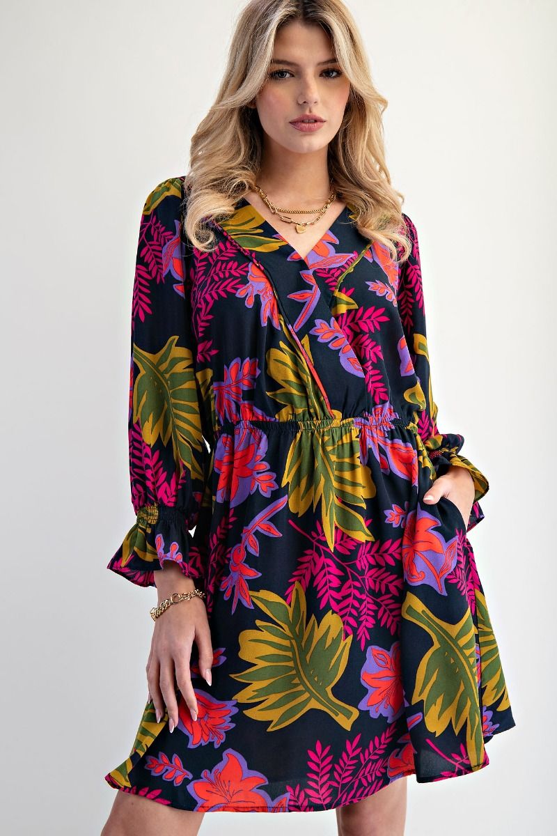 black mini dress with long sleeves, wrap v-neckline and a purple and pink floral pattern