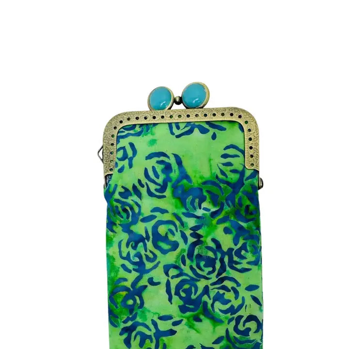 green glasses case with blue roses and decorative closure