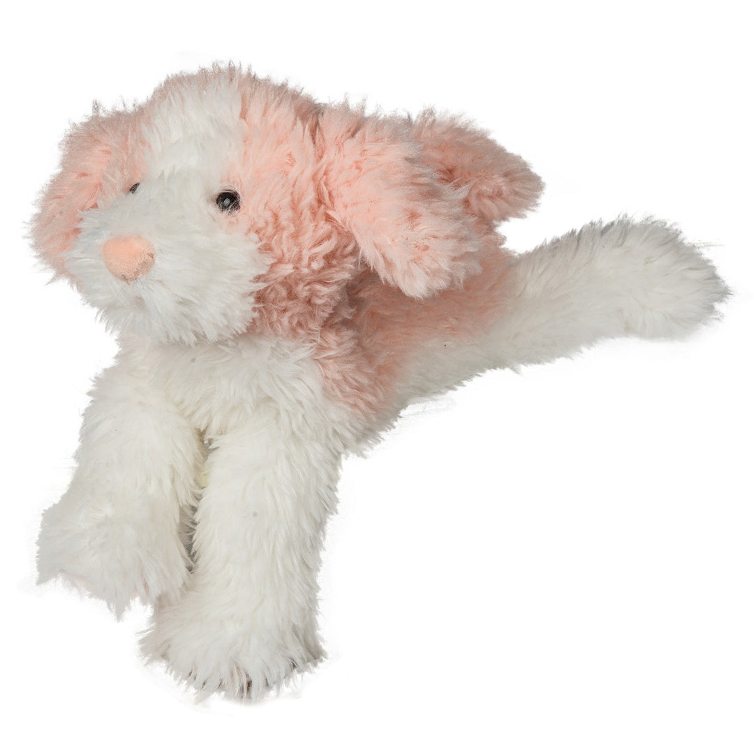 Plush toy dog with pink and white fur on a white background