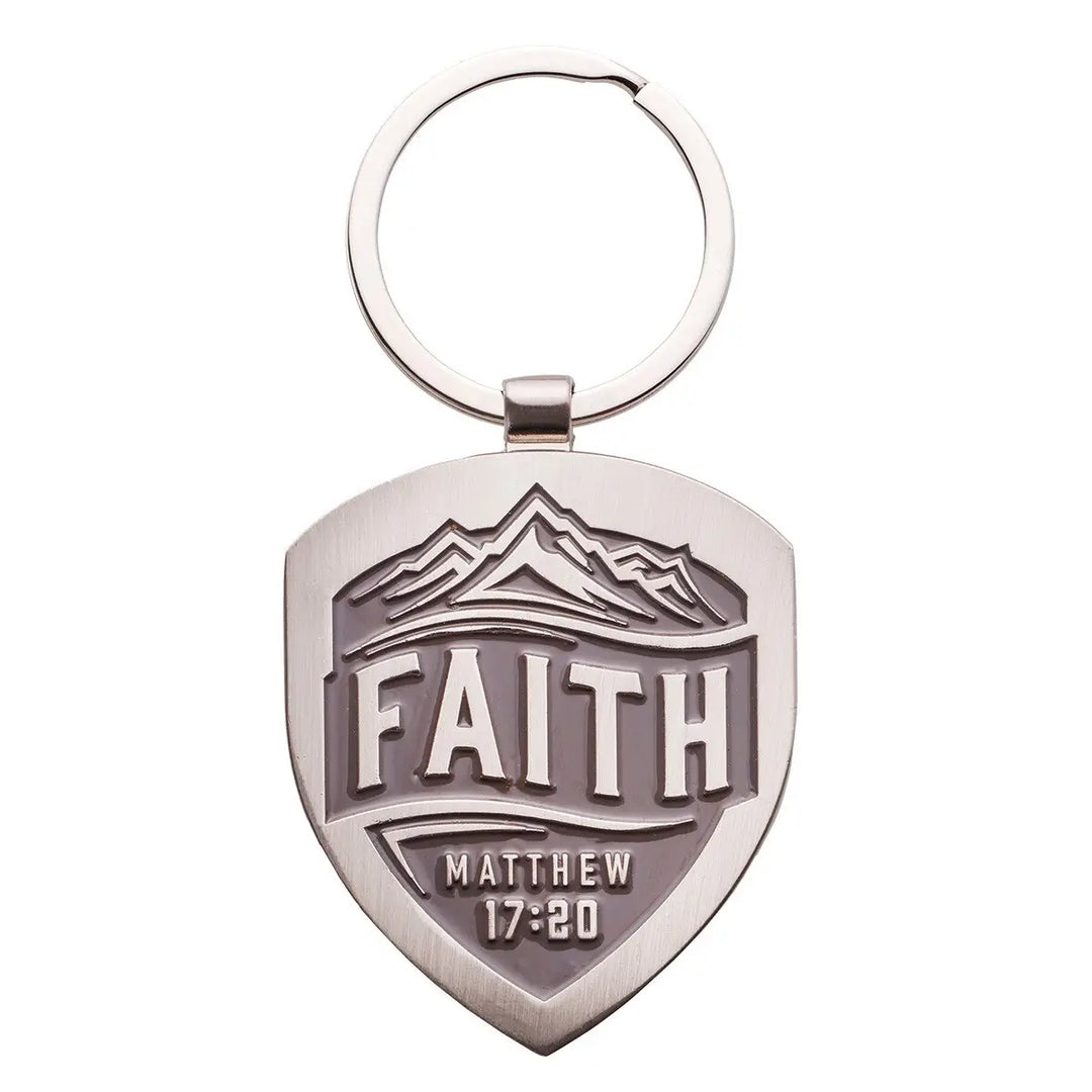Metal keychain with 'FAITH' and 'Matthew 17:20' text on a white background