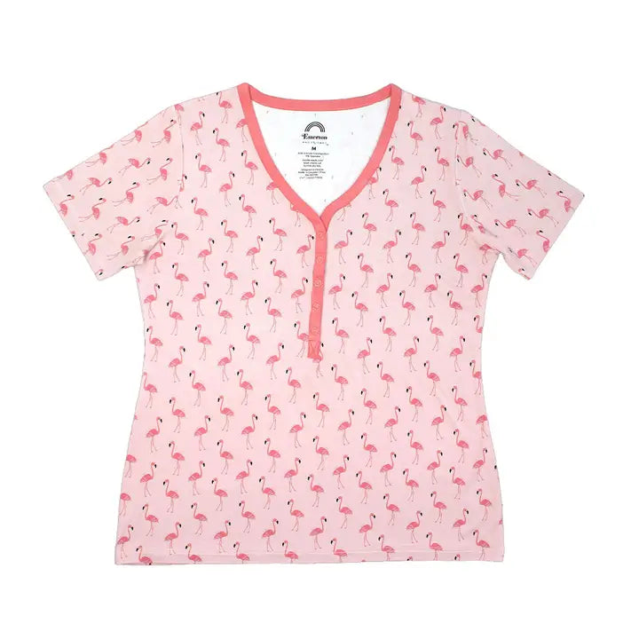 A short-sleeve V-neck t-shirt in light pink with an all-over flamingo print and a pink trim along the collar and split neckline.