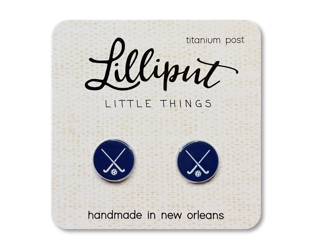 Navy blue circle with white field hocky sticks and ball post earrings
