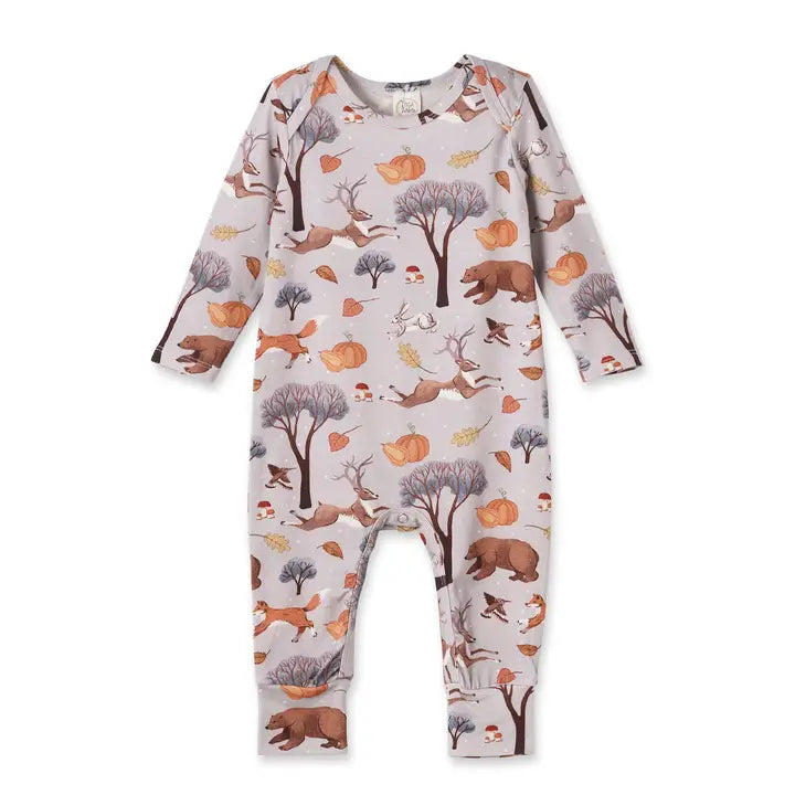 Baby onesie with forest animal pattern on a white background