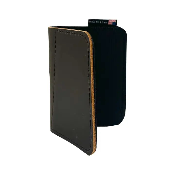 Black leather wallet with brown edge on a white background