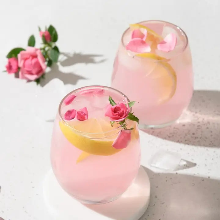 Pink drink in a wine glass