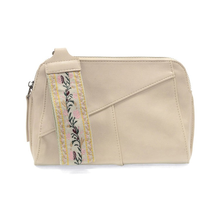 Stone color crossbody purse with guitar wrist strap