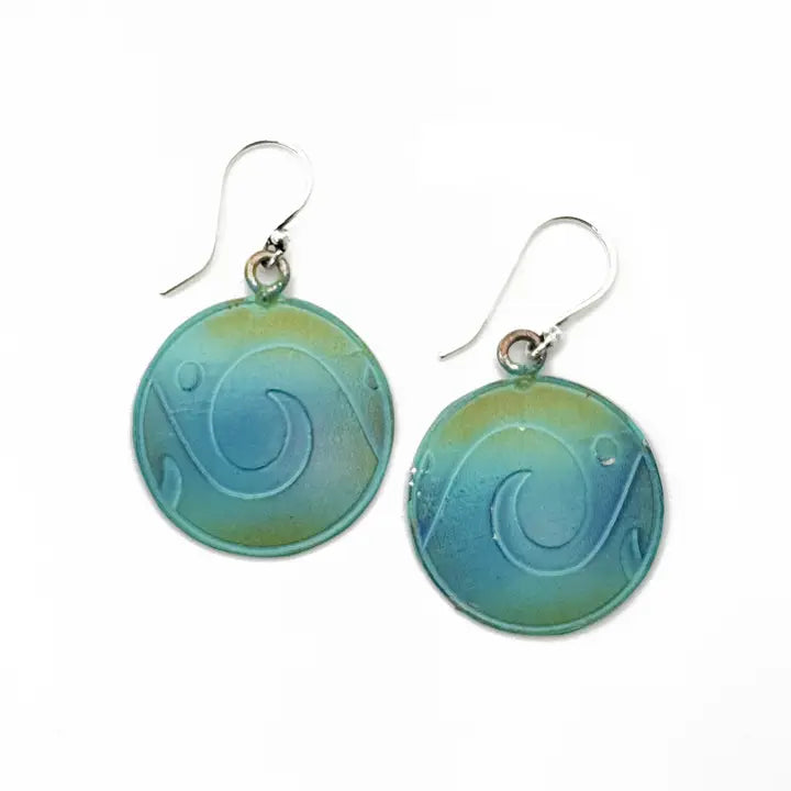 Pair of round earrings with a blue and green gradient on a white background