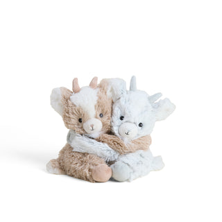 brown goat and gray goat plushies with arms wrapping around each other