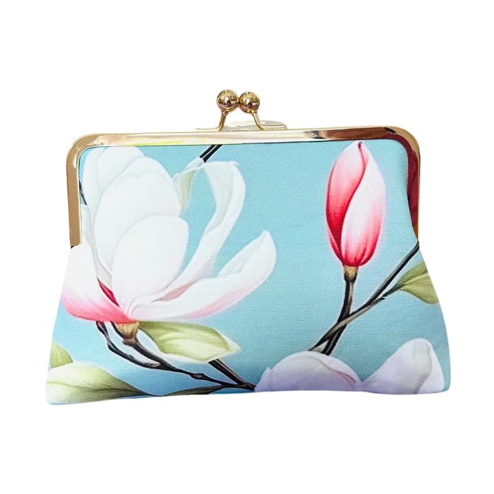 Clutch bag with floral design on a light blue background