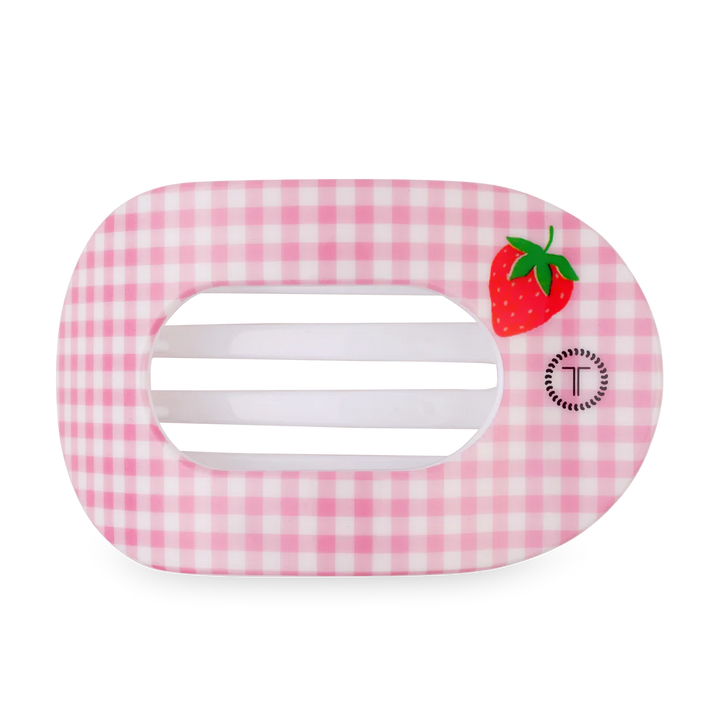 Pink gingham hair clip with a strawberry design on a white background