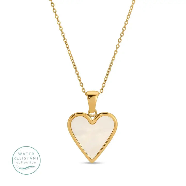Gold heart-shaped necklace with a white center on a white background